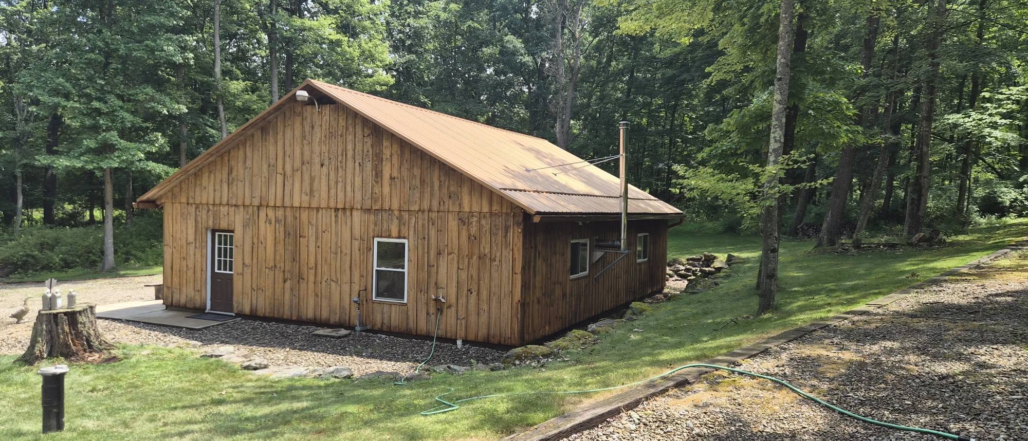 Wood outbuilding before exterior work